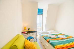 Giường trong phòng chung tại Central Luxury Living Europe Square,Balcony/Batumi