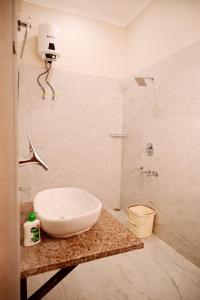 Vannituba majutusasutuses Surendra Villa Home Stay