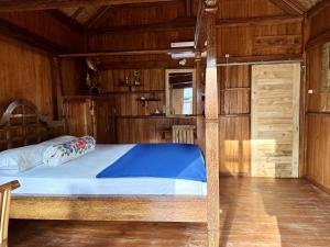 Postel nebo postele na pokoji v ubytování Kura Kura Beach