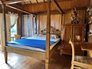 Postel nebo postele na pokoji v ubytování Kura Kura Beach