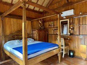 Postel nebo postele na pokoji v ubytování Kura Kura Beach