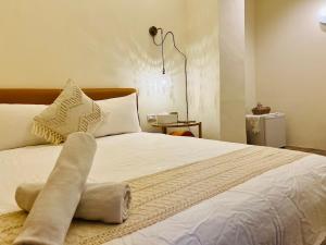 Llit o llits en una habitació de W24 Kenting Hostel II