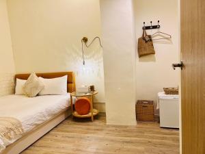 Llit o llits en una habitació de W24 Kenting Hostel II