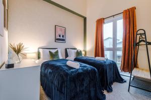Posteľ alebo postele v izbe v ubytovaní Beautiful House near Etihad with Free WiFi & Parking- Sleeps 6 by PureStay
