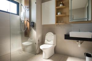 a bathroom with a toilet and a sink at Zenstay Abnb Perai Penang in Bukit Mertajam
