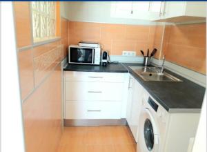 A kitchen or kitchenette at Agata Views