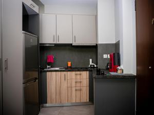 Luxury apartment ATG Acropolis tesisinde mutfak veya mini mutfak
