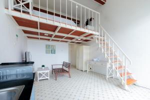 Fotografie z fotogalerie ubytování Urbanview Blessing Residence Surabaya by RedDoorz v destinaci Surabaja