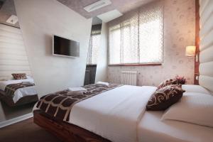 Postel nebo postele na pokoji v ubytování Apartments Belgrade