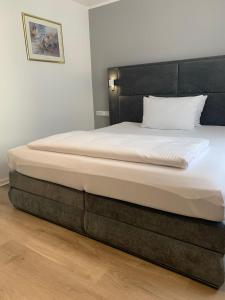 Postel nebo postele na pokoji v ubytování Hotel Wittlicher Hof