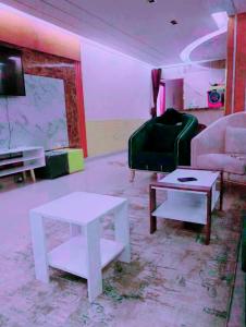 TV a/nebo společenská místnost v ubytování Mini VELLA ALJWHARA