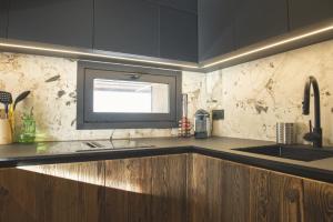 Η κουζίνα ή μικρή κουζίνα στο SmartStay Cocon Alpin - Meribel +26 φωτογραφίες