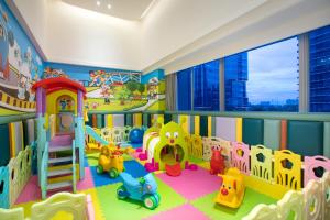 a childs play room with toys in it at Citadines Keqiao Shaoxing in Shaoxing