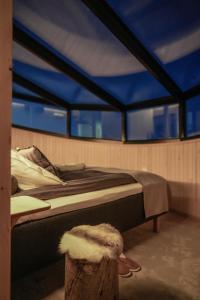 Ένα ή περισσότερα κρεβάτια σε δωμάτιο στο Livo Arctic Resort