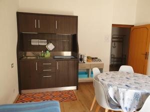 A kitchen or kitchenette at Hotel Cormorano