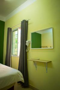 Letto o letti in una camera di Nima guest house