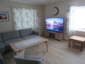 TV a/nebo společenská místnost v ubytování Higravstinden House - Lofoten