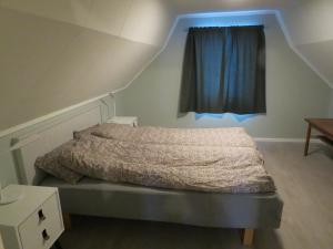 Katil atau katil-katil dalam bilik di Higravstinden House - Lofoten