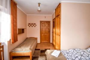 Posteľ alebo postele v izbe v ubytovaní U Cudzicha
