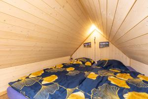 Una cama o camas en una habitación de Apt. Plešivec