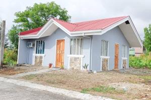 a small house with a red roof at 2B Tiny Home in Iba Zambales in Iba