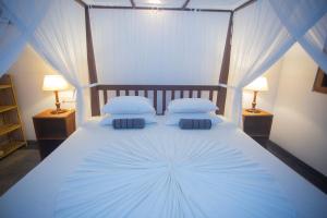 Postel nebo postele na pokoji v ubytování THE CHILLI STUDIO APARTMENT + 19 fotografií