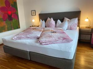 A bed or beds in a room at Haus Wieser