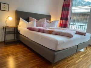 A bed or beds in a room at Haus Wieser