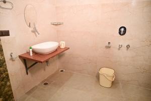 Vannituba majutusasutuses Surendra Villa Home Stay