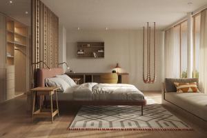 1 dormitorio con cama y escritorio en Pachers - your inspiring place, en Bresanona