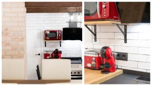 een keuken met een rood apparaat aan de muur bij Apartamentos Granadal in Toledo