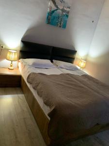 Postel nebo postele na pokoji v ubytování Tetne Qor Guesthouse