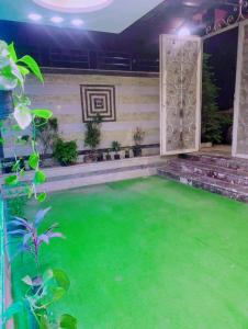 Bazén v ubytování Mini VELLA ALJWHARA nebo v jeho okolí