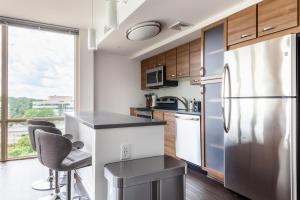 A kitchen or kitchenette at Tysons Corner 2br w concierge nr shopping mall WDC-815