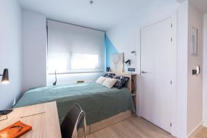 Postel nebo postele na pokoji v ubytování Micampus Salamanca Student Residence