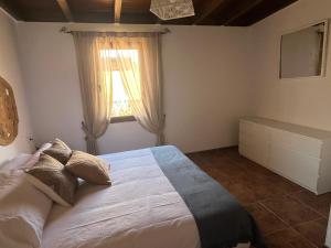 Postel nebo postele na pokoji v ubytování Villa Nieves