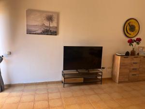 TV a/nebo společenská místnost v ubytování Villa Nieves