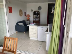 Istumisnurk majutusasutuses APPARTEMENT COSY TERRASSE VUE MER - TROIS ÎLETS
