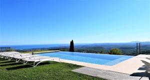 a villa with a swimming pool with a view at La Bastide des Pins in Vence +31 photos