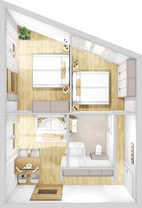 una ricostruzione di un piccolo appartamento con cucina e soggiorno di Arton Lachtal - Apartments Steiermark a Schönberg-Lachtal