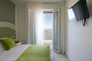 Postel nebo postele na pokoji v ubytování Residence Flow-R + 37 fotografií