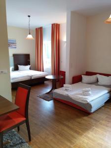 Postel nebo postele na pokoji v ubytování Hotel Auf der Bühn