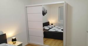 Postel nebo postele na pokoji v ubytování APARTMÁN KRISTÝNA