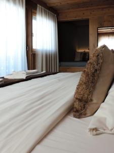 Letto o letti in una camera di Silva: The Alpine Chalet
