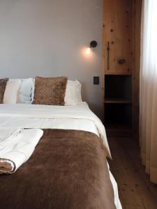 Letto o letti in una camera di Silva: The Alpine Chalet