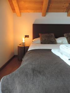 Letto o letti in una camera di Silva: The Alpine Chalet