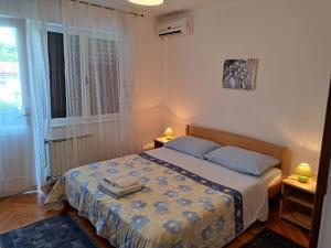 Postel nebo postele na pokoji v ubytování Accomodation Mirjana Rooms