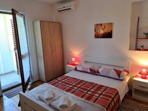 Postel nebo postele na pokoji v ubytování Accomodation Mirjana Rooms