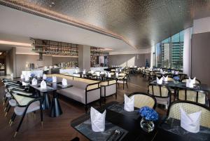 Restoranas ar kita vieta pavalgyti apgyvendinimo įstaigoje Ramada by Wyndham Huizhou Double Moon Bay