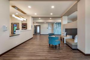 a hospital hallway with a waiting area and a waiting room at MainStay Suites Milwaukee-Franklin in Franklin